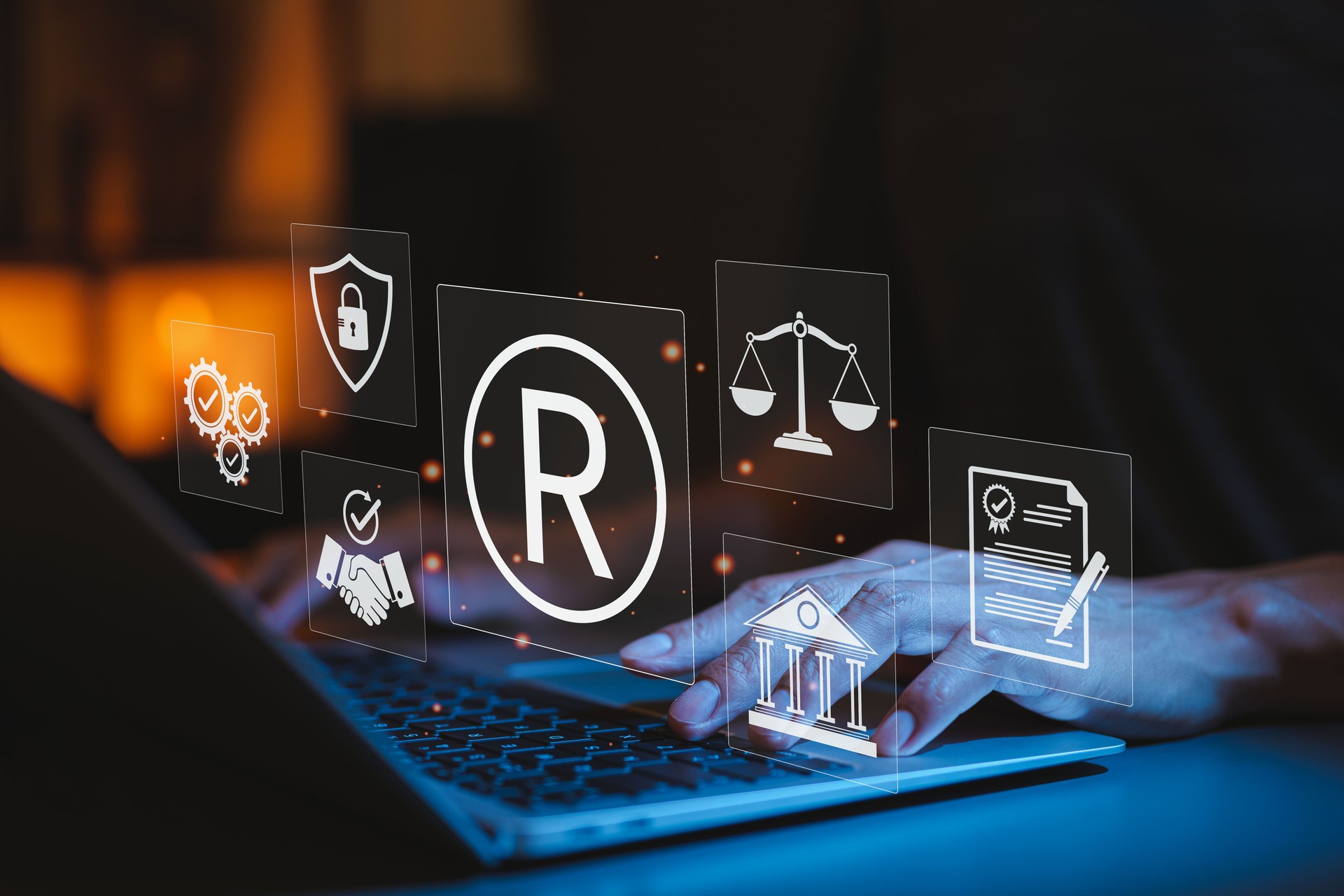 Registered Trademark and Intellectual Property Protection Concept. Typing on laptop with trademark symbol and legal icons, intellectual property, legal rights, brand protection, and business security.